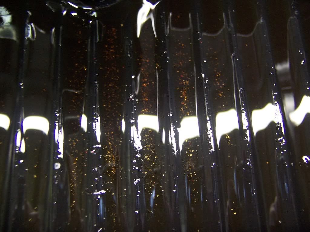 Metal flakes in oil!